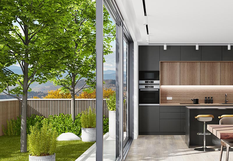 A kitchen and an outdoor garden terrace.